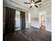 Bright dining room with wood flooring and window with shutters at 182 Monica St, Port Charlotte, FL 33954