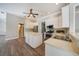 Spacious kitchen with island, stainless steel appliances, and white cabinets at 182 Monica St, Port Charlotte, FL 33954