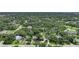 Property located in a wooded neighborhood with a large lot and privacy at 182 Monica St, Port Charlotte, FL 33954