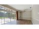 Gathering room with sliding glass doors to the backyard and pool at 182 Monica St, Port Charlotte, FL 33954