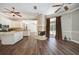 Open living room with stone fireplace and access to the backyard at 182 Monica St, Port Charlotte, FL 33954