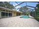 Screened pool and spa with expansive patio at 182 Monica St, Port Charlotte, FL 33954