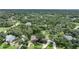 Large home with a spacious backyard nestled in a wooded area at 182 Monica St, Port Charlotte, FL 33954