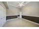Bedroom with double door closet and ceiling fan at 182 Monica St, Port Charlotte, FL 33954