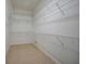 Large walk-in closet with wire shelving and hanging rods at 182 Monica St, Port Charlotte, FL 33954