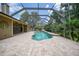 Spacious pool and spa with screened enclosure at 182 Monica St, Port Charlotte, FL 33954