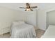 Charming bedroom with queen bed, white dresser and walk-in closet at 6701 Elmwood Rd, North Port, FL 34287