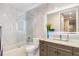 Bright bathroom with shower/tub combo, marble tile, and vanity at 1340 Rock Dove Ct # 134, Punta Gorda, FL 33950