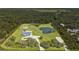 Aerial view of a home with a pond and large lot at 15300 Water Oak Ct, Punta Gorda, FL 33982
