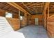 Spacious barn interior with wooden stalls and open floor plan at 15300 Water Oak Ct, Punta Gorda, FL 33982