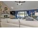 Living area with sectional sofa and pool view at 15300 Water Oak Ct, Punta Gorda, FL 33982