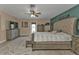 Large main bedroom with a king-size bed and access to the backyard at 15300 Water Oak Ct, Punta Gorda, FL 33982