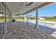 Relaxing pool area with covered patio and backyard views at 15300 Water Oak Ct, Punta Gorda, FL 33982