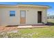 Backyard with patio, shed, and laundry area at 3372 Lucerne Ter, Port Charlotte, FL 33952