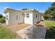 Exterior view of the house with a patio at 3372 Lucerne Ter, Port Charlotte, FL 33952