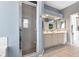 Bathroom features double vanity, shower, and updated tile at 1708 Palace Ct, Punta Gorda, FL 33980