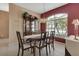 Formal dining room with dark wood table and chairs at 1708 Palace Ct, Punta Gorda, FL 33980