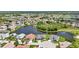 Aerial view of homes and lake in Del Webb community at 1708 Palace Ct, Punta Gorda, FL 33980