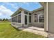 Exterior view of sunroom with access to patio at 1708 Palace Ct, Punta Gorda, FL 33980