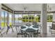 Sunroom with water view and seating area at 1708 Palace Ct, Punta Gorda, FL 33980