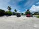 Parking area with cars parked, providing ample parking at 820 Kings Ct # D, Punta Gorda, FL 33950