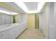 Elegant bathroom with double vanity and bright lighting at 4041 Michel Tree St, Port Charlotte, FL 33948