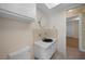 Guest bathroom with single sink vanity and updated tile at 4041 Michel Tree St, Port Charlotte, FL 33948