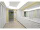 Well-appointed bathroom with double vanity and ample storage at 4041 Michel Tree St, Port Charlotte, FL 33948
