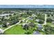 Wide aerial view of the house and surrounding area at 4041 Michel Tree St, Port Charlotte, FL 33948