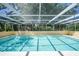 Inviting screened-in pool with plenty of space for relaxation at 4041 Michel Tree St, Port Charlotte, FL 33948
