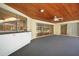 Covered patio with pool access, ceiling fan and adjacent kitchen access at 4041 Michel Tree St, Port Charlotte, FL 33948