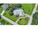 Aerial view showing home, pool, and neighborhood at 4041 Michel Tree St, Port Charlotte, FL 33948