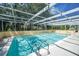Sparkling, screened-in pool perfect for relaxation at 4041 Michel Tree St, Port Charlotte, FL 33948