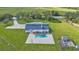 Aerial view showing a house, pool, and spacious backyard at 15300 Water Oak Ct, Punta Gorda, FL 33982