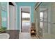 Bathroom with pool view and walk-in shower at 15300 Water Oak Ct, Punta Gorda, FL 33982