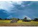 Double rainbow over a field with lush vegetation at 15300 Water Oak Ct, Punta Gorda, FL 33982