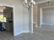 Bright dining area with tile floors and access to kitchen at 10045 Bay State Dr, Port Charlotte, FL 33981