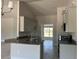 Modern kitchen with granite countertops and stainless steel appliances at 10045 Bay State Dr, Port Charlotte, FL 33981