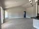 Open living room with high ceilings and tile flooring at 10045 Bay State Dr, Port Charlotte, FL 33981