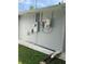 Exterior wall with solar panel system and electrical box at 2106 Switzerland Rd, North Port, FL 34288