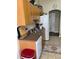 Kitchen features ample counter space, wood cabinets, and white appliances at 2106 Switzerland Rd, North Port, FL 34288