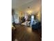 Spacious living room with hardwood floors and comfortable seating at 2106 Switzerland Rd, North Port, FL 34288