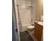 Full bathroom with tub, shower, vanity, and wood cabinet at 2106 Switzerland Rd, North Port, FL 34288
