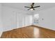 Bright bedroom with wood-look floors and large closet at 791 Haleybury St, Port Charlotte, FL 33948