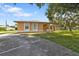 Charming single-story home with a well-maintained lawn at 791 Haleybury St, Port Charlotte, FL 33948