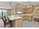 Kitchen with breakfast bar and wood cabinets at 791 Haleybury St, Port Charlotte, FL 33948