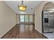 Bright dining room with wood flooring and large windows at 791 Haleybury St, Port Charlotte, FL 33948