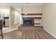 Living room with brick fireplace and wood mantel at 791 Haleybury St, Port Charlotte, FL 33948