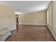 Living room with wood-look floors and large windows at 791 Haleybury St, Port Charlotte, FL 33948