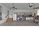 Spacious garage with ceiling fans and workbench at 791 Haleybury St, Port Charlotte, FL 33948